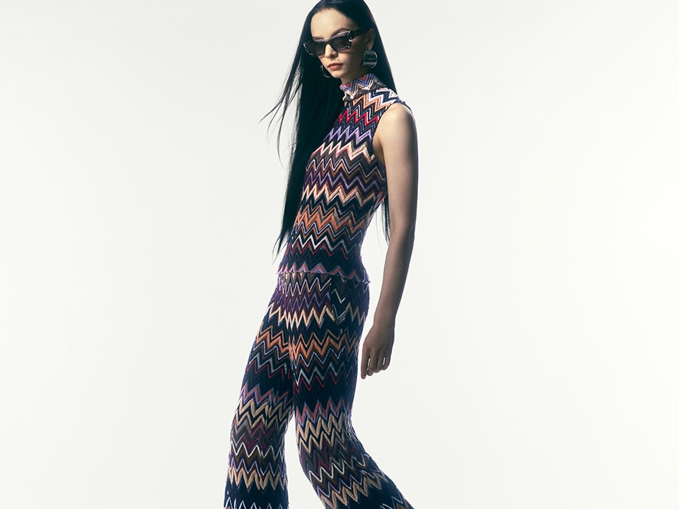 A model is wearing a multicolour zig zag sleeveless top with matched pants