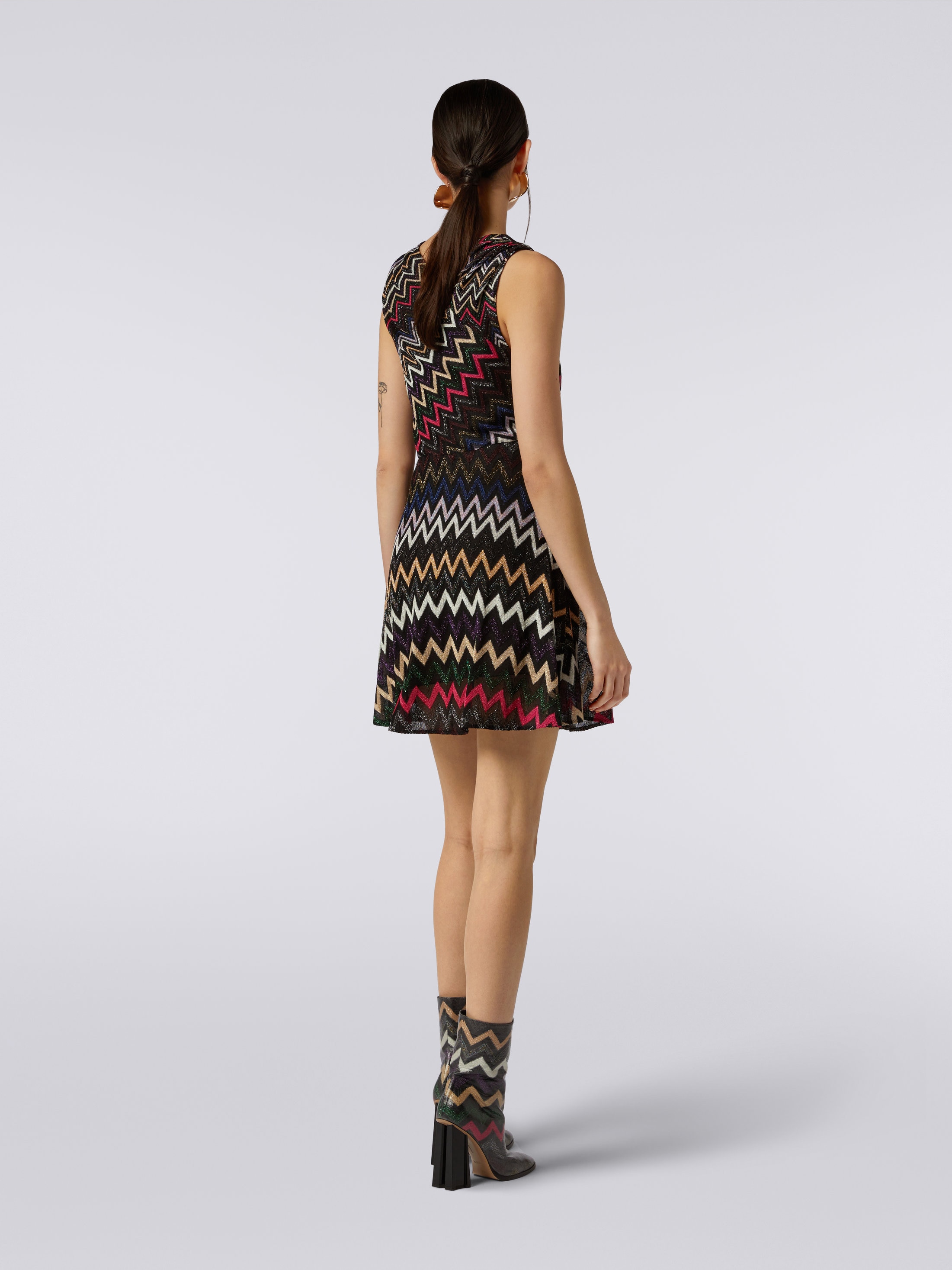 Zigzag patterned mini dress with crossover neckline