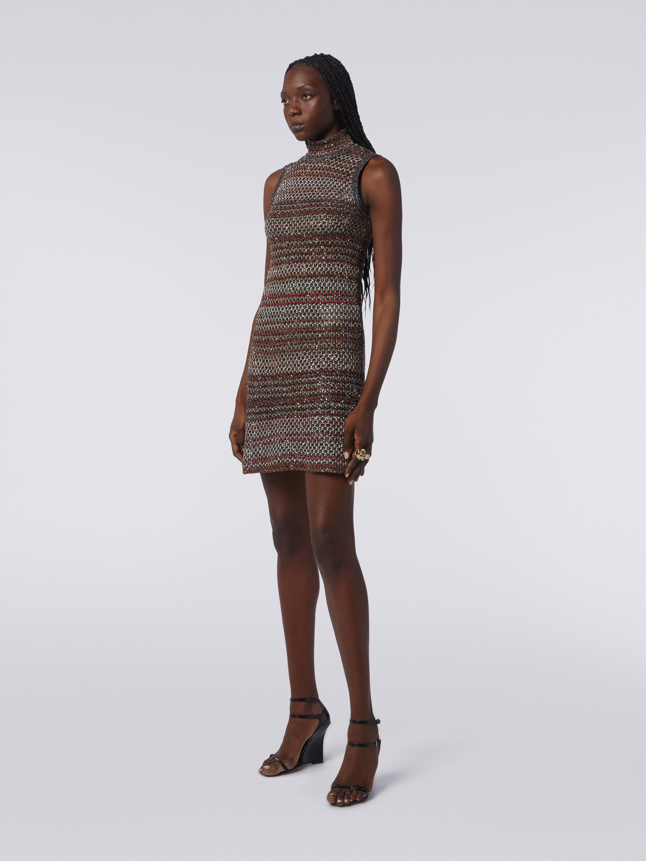 Minidress in mesh knit with high neck and sequin appliqué