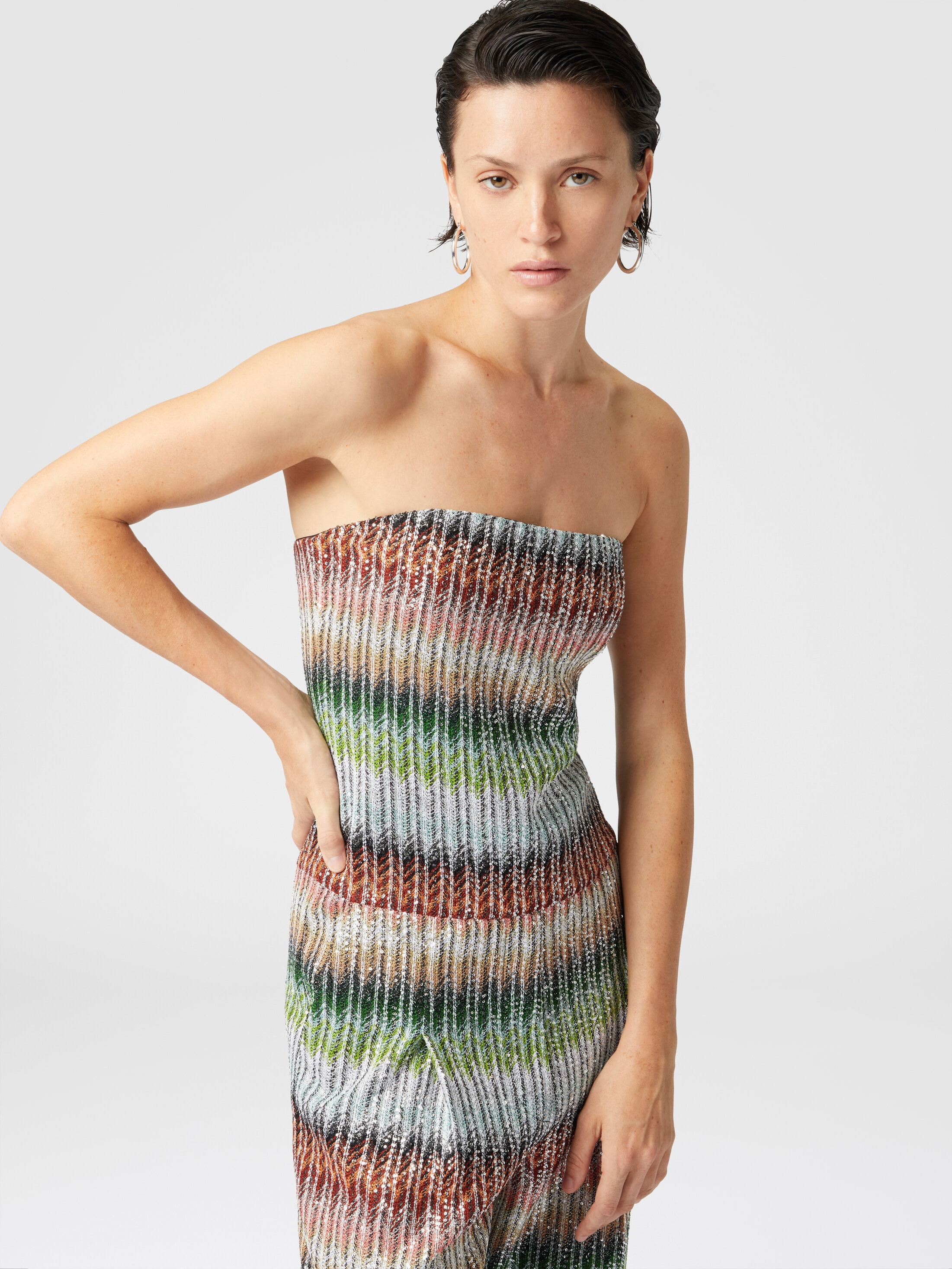 Long bustier jumpsuit in gradient zigzag knit with sequins