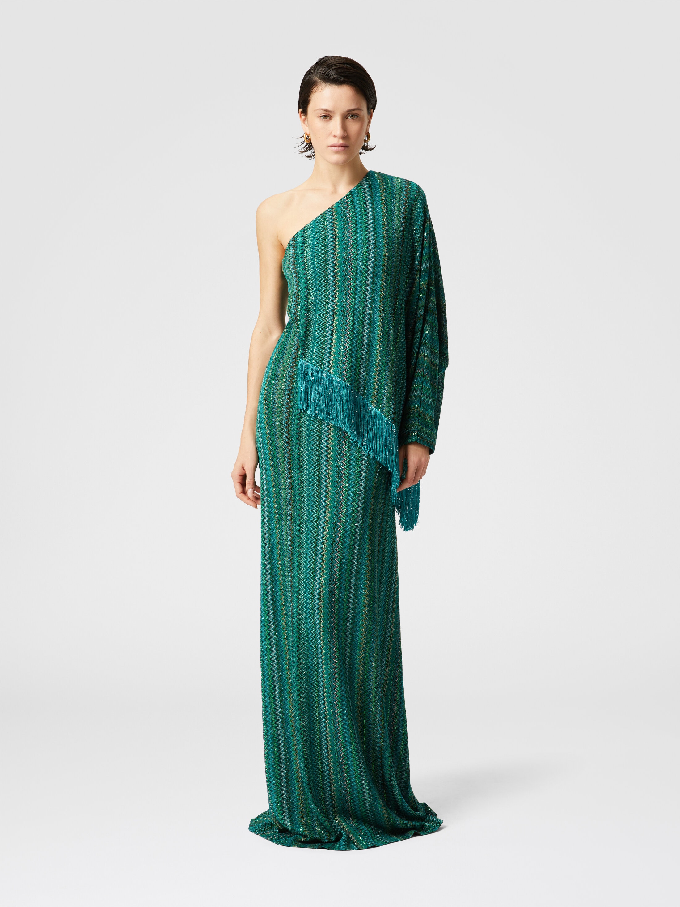 Long one-shoulder zigzag dress with sequins and fringes Long one-shoulder zigzag dress with sequins and fringes