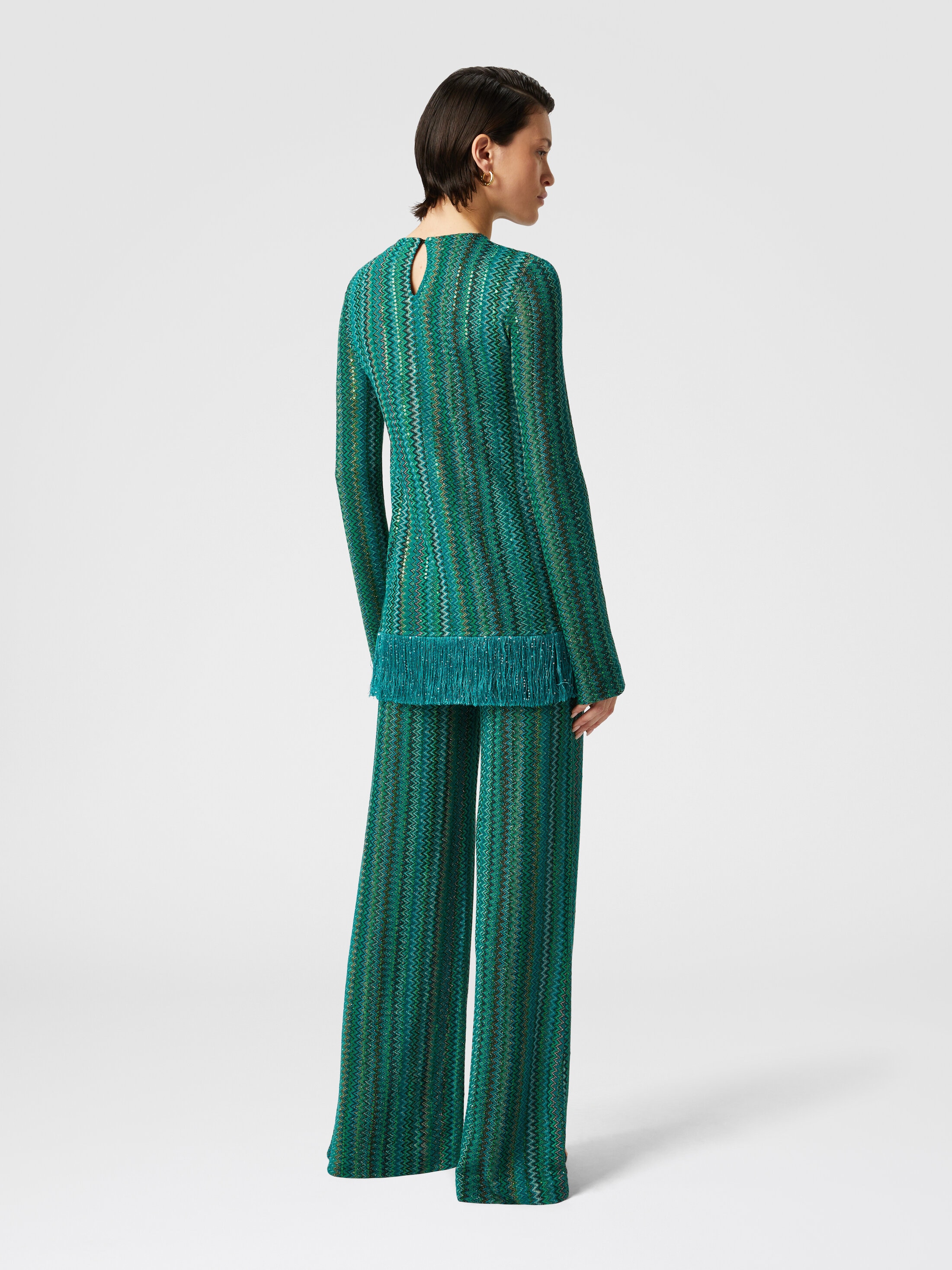 Zig zag sweater with sequins and asymmetrical hem with