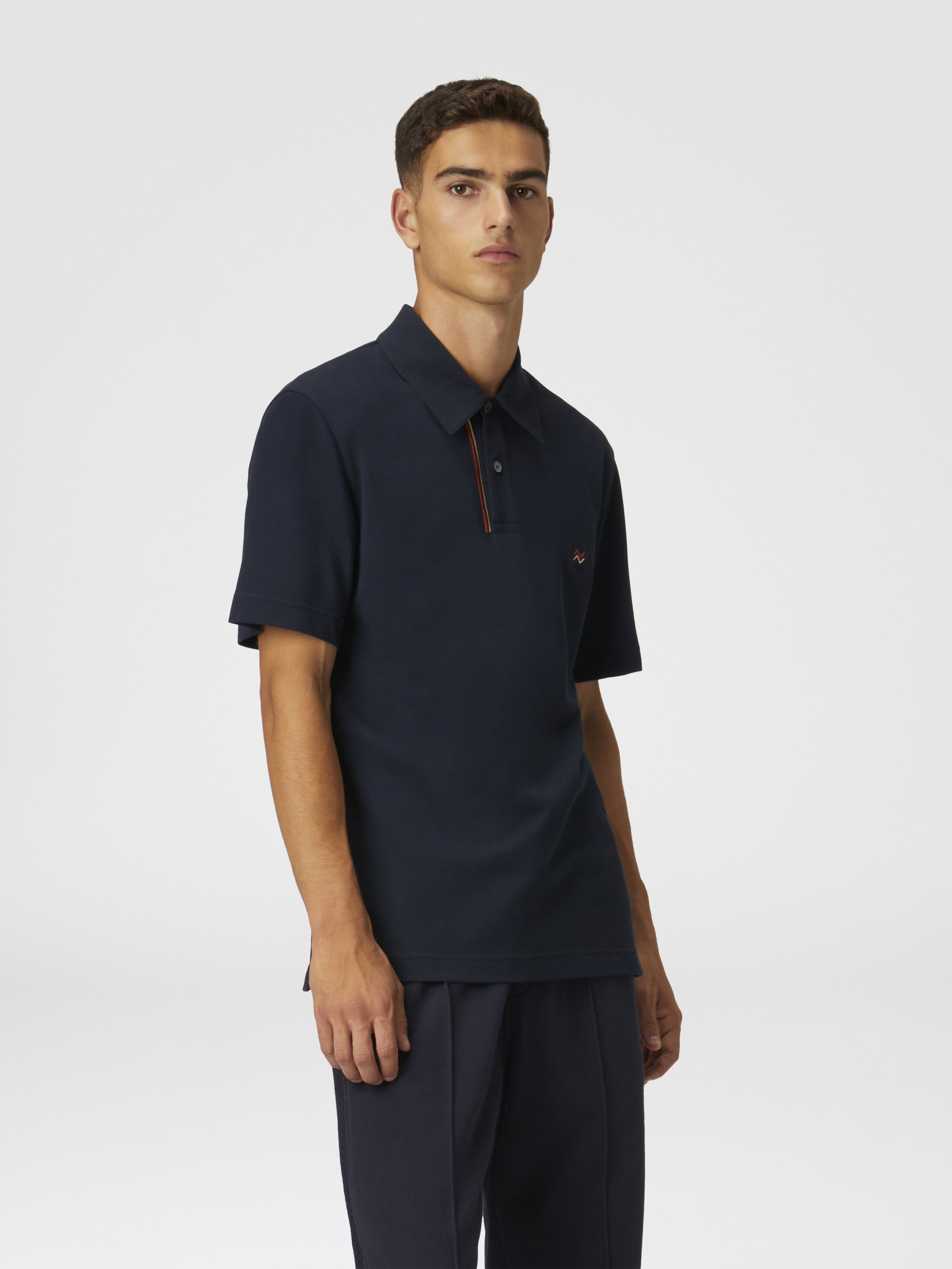 Solid color cotton piqué polo shirt with zigzag embroidery and