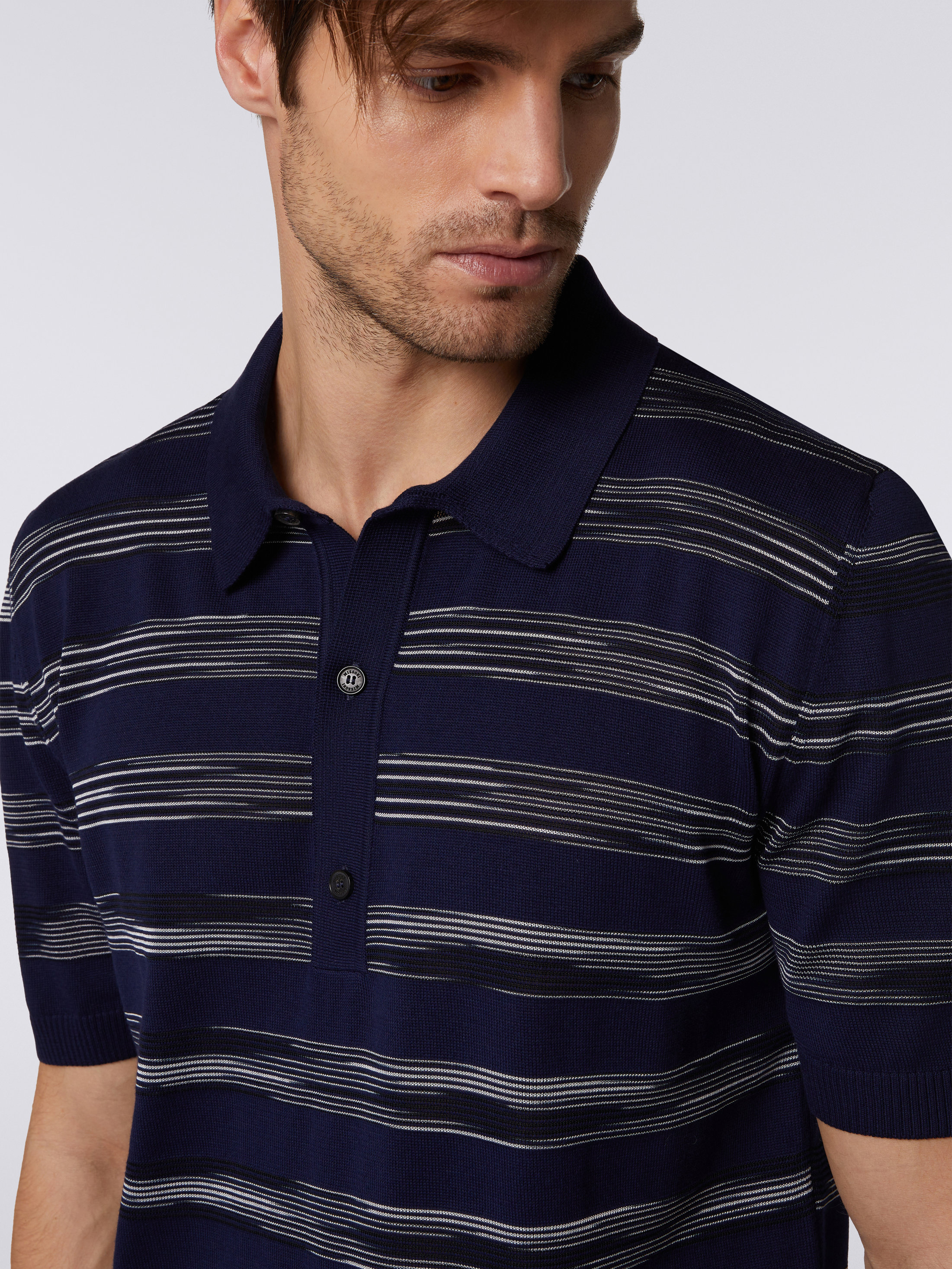 navy blue and white striped polo shirt