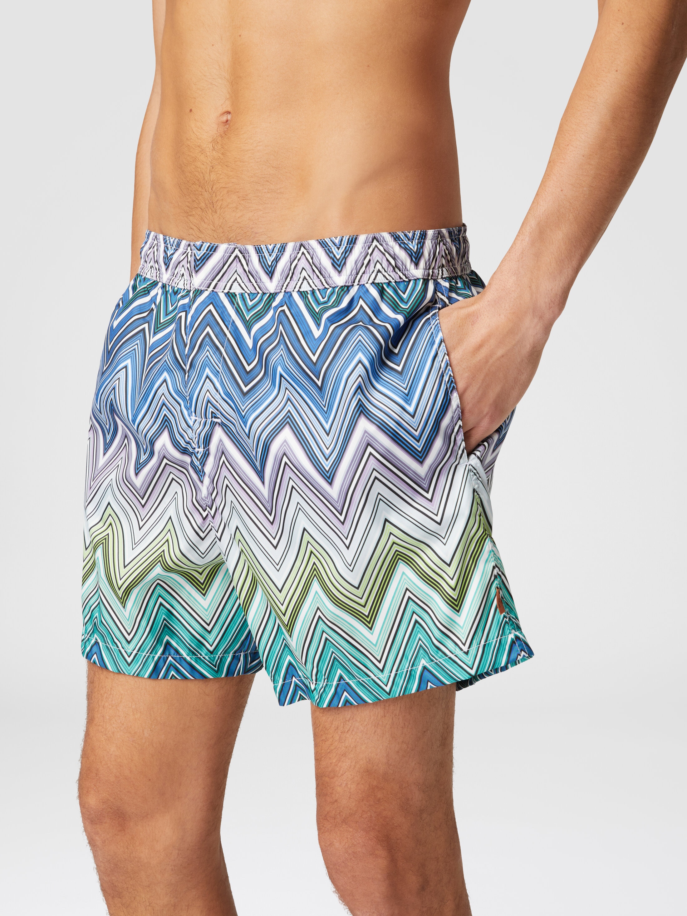 Swimming trunks with large zigzag print