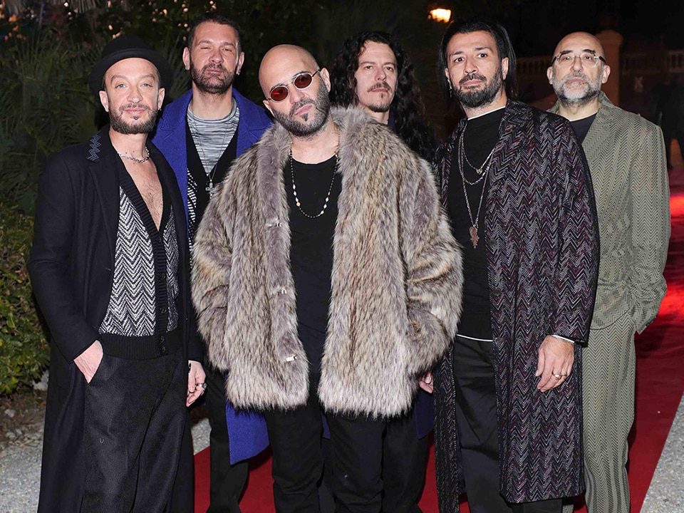 A shot from the red carpet of Sanremo Festival where the components of Negramaro wore different outfits from the Missoni collection