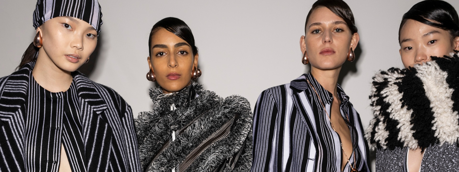 A group of model is wearing outfits from the new FW24 show collection