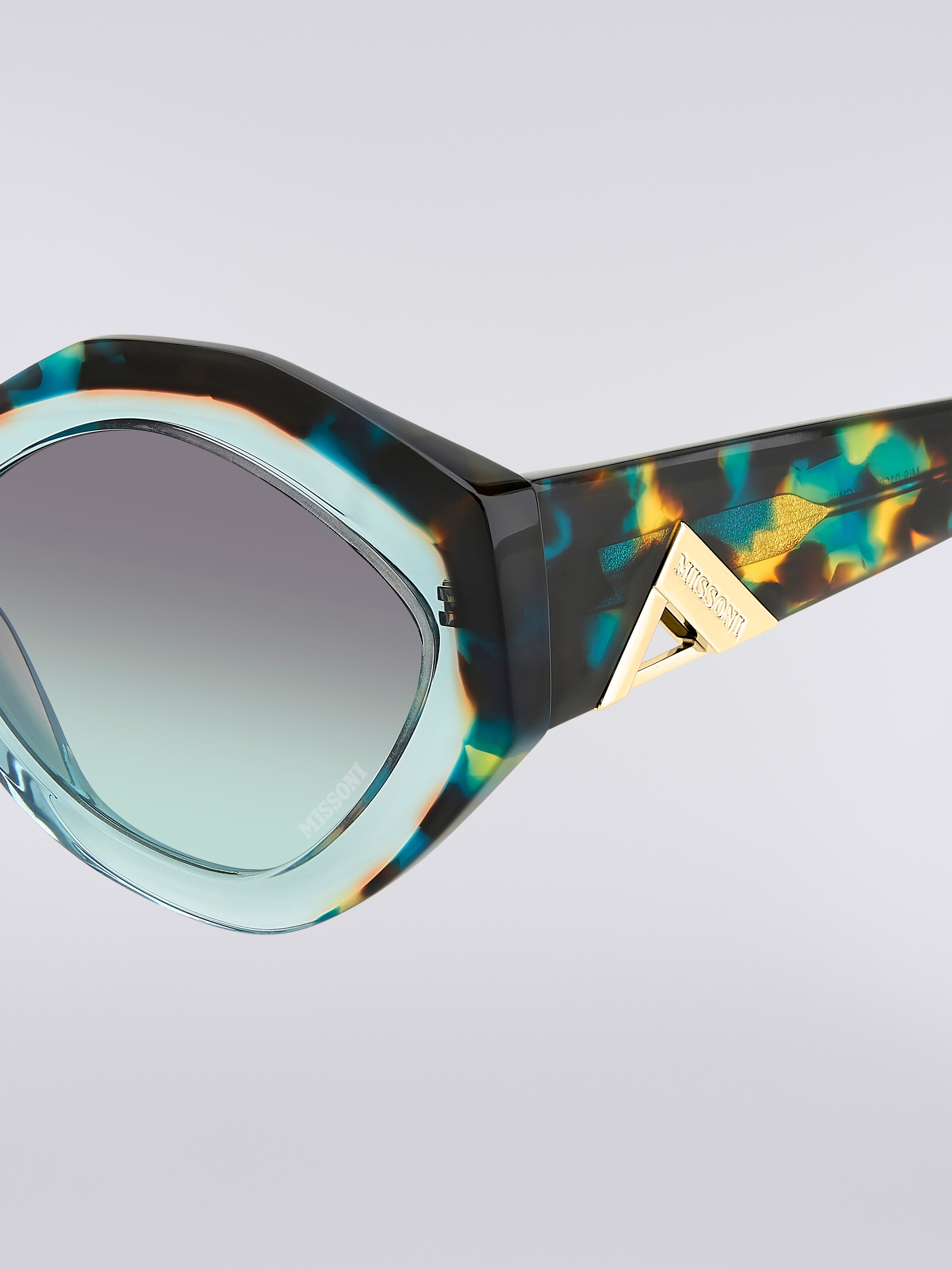 Sonnenbrille mit ovaler Fassung und Logo-Applikation aus Metall, Mehrfarbig  - 3